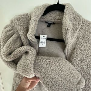 sherpa puffy express zip up